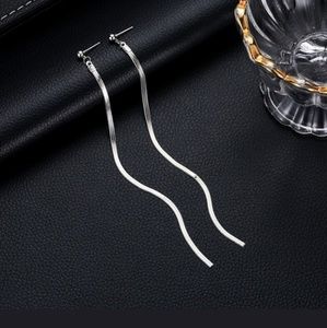 White gold tone tassel earrings